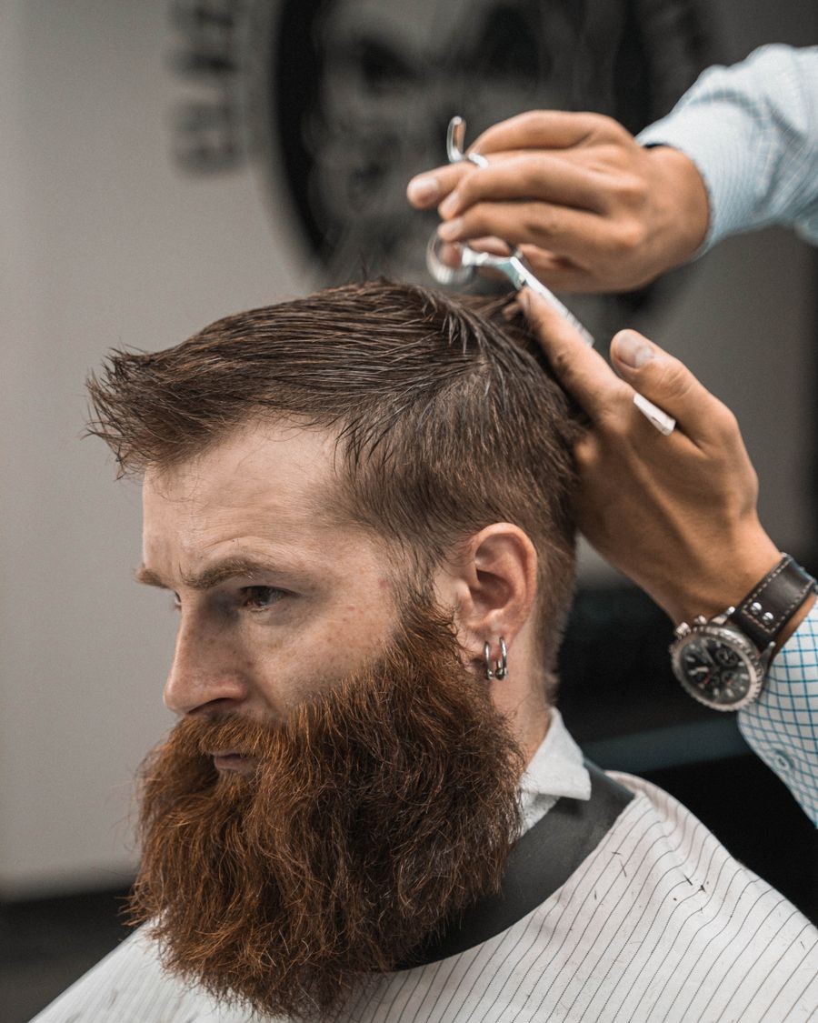 Instagram post of a barbershop made by Posty